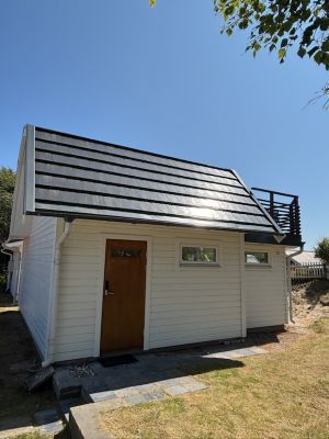 Stuga med havsutsikt