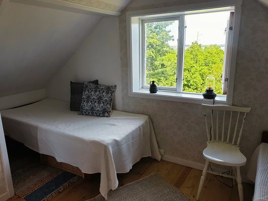 Bild 4 på Nyrenoverad stuga, havsutsikt och mysig atmosfär.