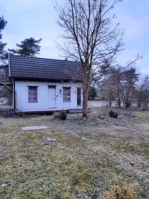 Gäststuga med altan