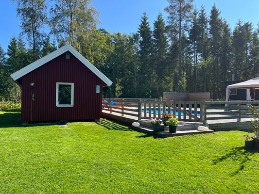 Mysig stuga med uppvärmd pool och bastu - Bild 24