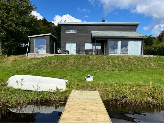 Bild 4 på Modern villa med sjötomt och brygga