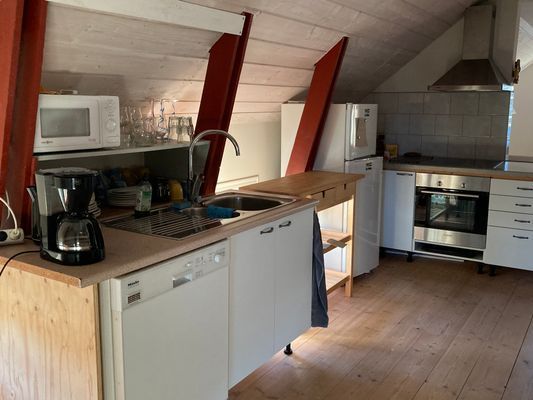 Modern nybyggd lägenhet på en liten lammgård