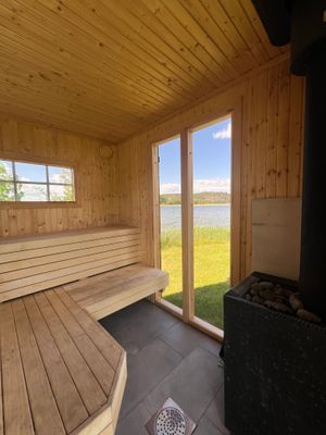 Hus med sjötomt, brygga, sandstrand, max kvällssol - Bild 38
