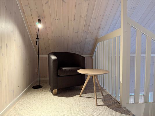 Loft med fotölj