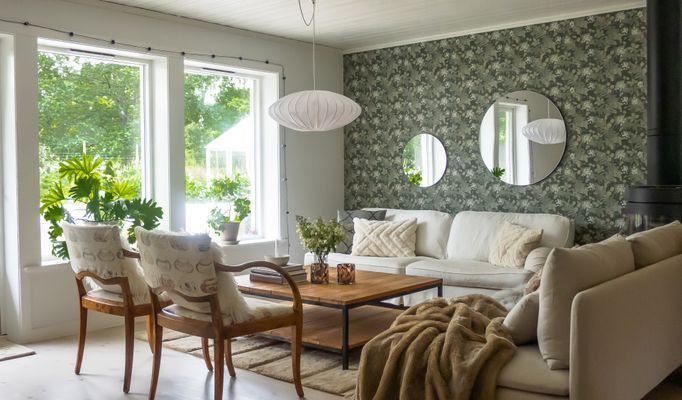 Villa med växthus och stor tomt i naturskön miljö