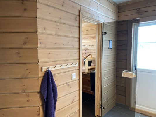Villa Fjällsaga, timmerhus med ski-in/ski-out läge - Bild 14