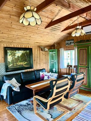 Naturnära stuga på höjd med sjöutsikt - Bild 12