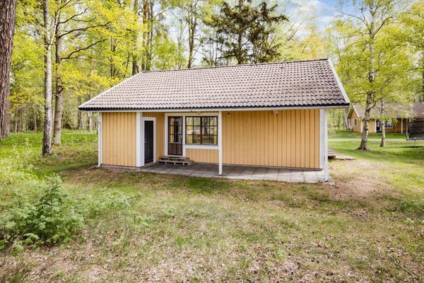 Mysig stuga vid stranden