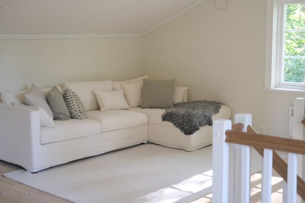 Vardagsrum på ovanvåningen, med bäddsoffa