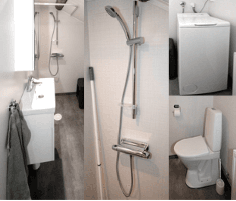 Badrum med dusch, vattentoalett och tvättmaskin