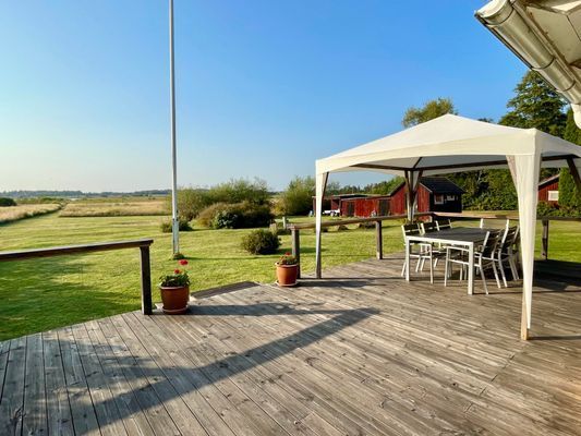 Sjötomt med privat brygga, roddbåt & solnedgång - Bild 8