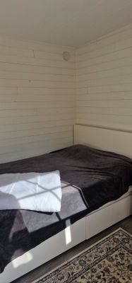 Säng i gäststuga