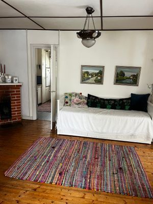 Vardagsrum med två bäddar