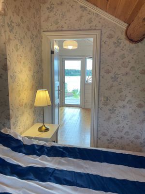 Timmerhus med egen sandstrand och brygga, inkl båt - Bild 35