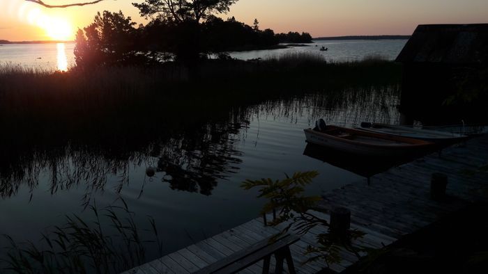 Solnedgång från gemensam brygga