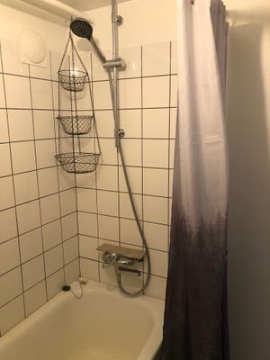 Badkar med dusch