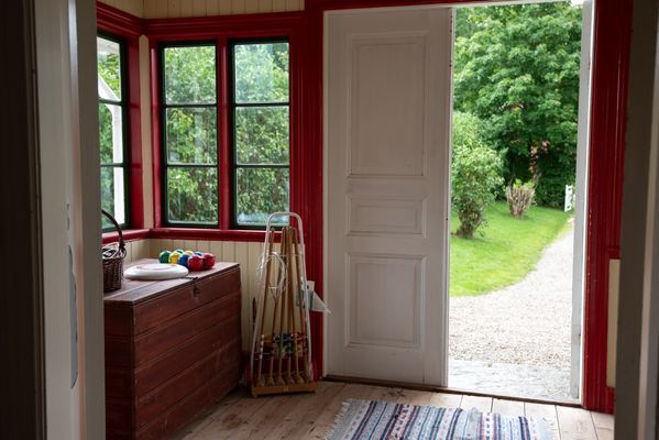 Glasveranda - med träsgårdsspel