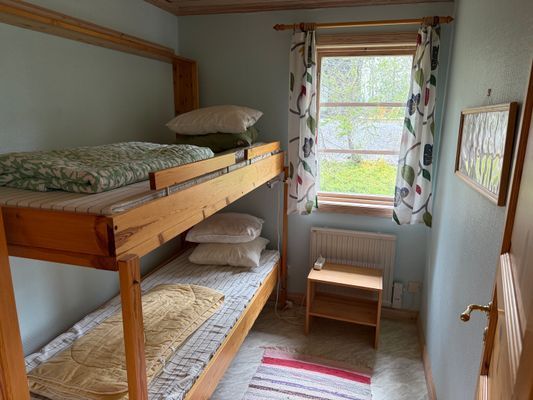 Stuga med fjäll- och sjöutsikt, bastu, och kamin - Bild 10