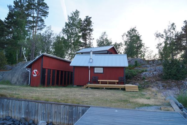 Bastu byggnad med terrass utanför