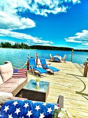 Timmerhus med egen sandstrand och brygga, inkl båt - Bild 26