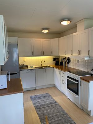 Luftig minivilla och smart planerad attefallare - Bild 5