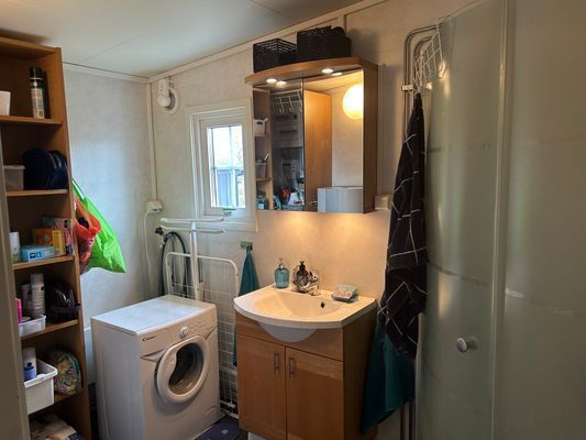 Dusch o toa med Tvättmaskin