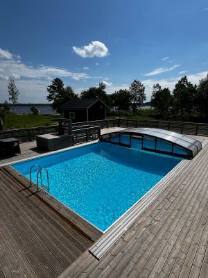 Semesterhus vid sjön med pool och elbåt - Bild 4