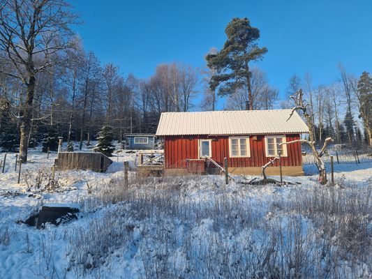 Lantlig stuga med utsikt