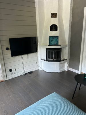 Braskamin i rummet med Sweefsoffa