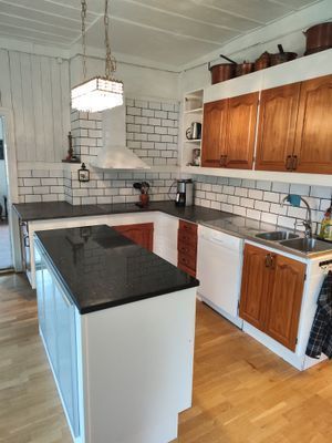 1800-tals hus med utsikt över Ångermanälven